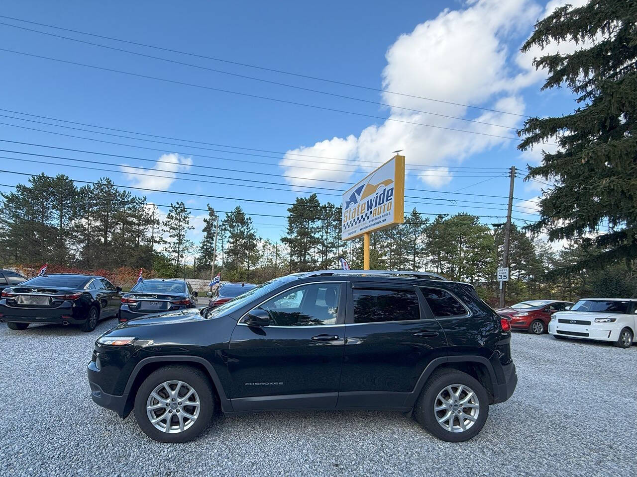 2016 Jeep Cherokee for sale at Statewide Auto LLC in Akron, OH