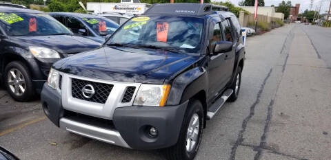 2009 Nissan Xterra for sale at Howe's Auto Sales in Lowell MA