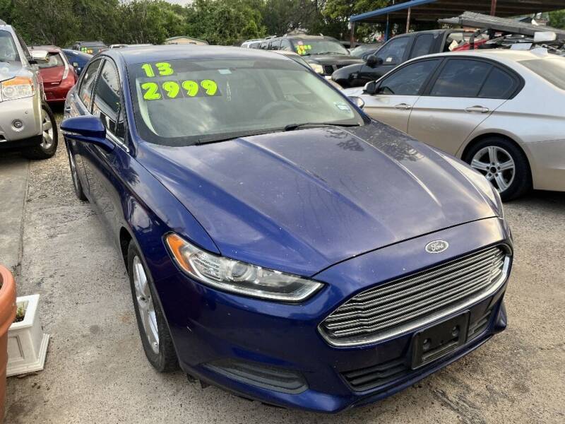 2013 Ford Fusion for sale at SCOTT HARRISON MOTOR CO in Houston TX
