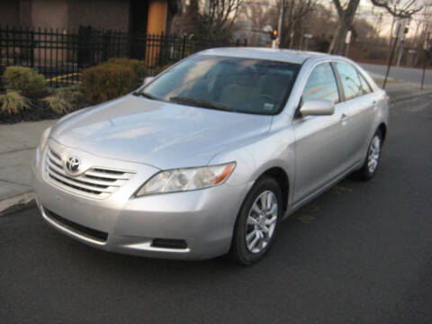 2009 Toyota Camry for sale at Top Choice Auto Inc in Massapequa Park NY