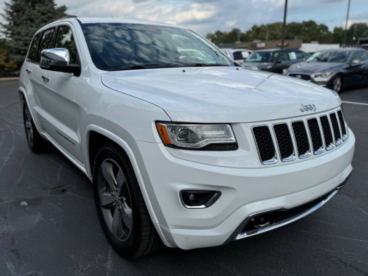 2015 Jeep Grand Cherokee for sale at Opus Motorcars in Utica, MI