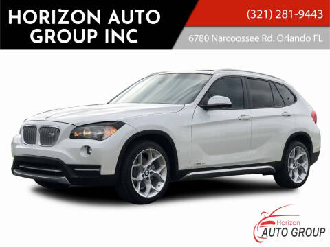 2013 BMW X1 for sale at HORIZON AUTO GROUP INC in Orlando FL