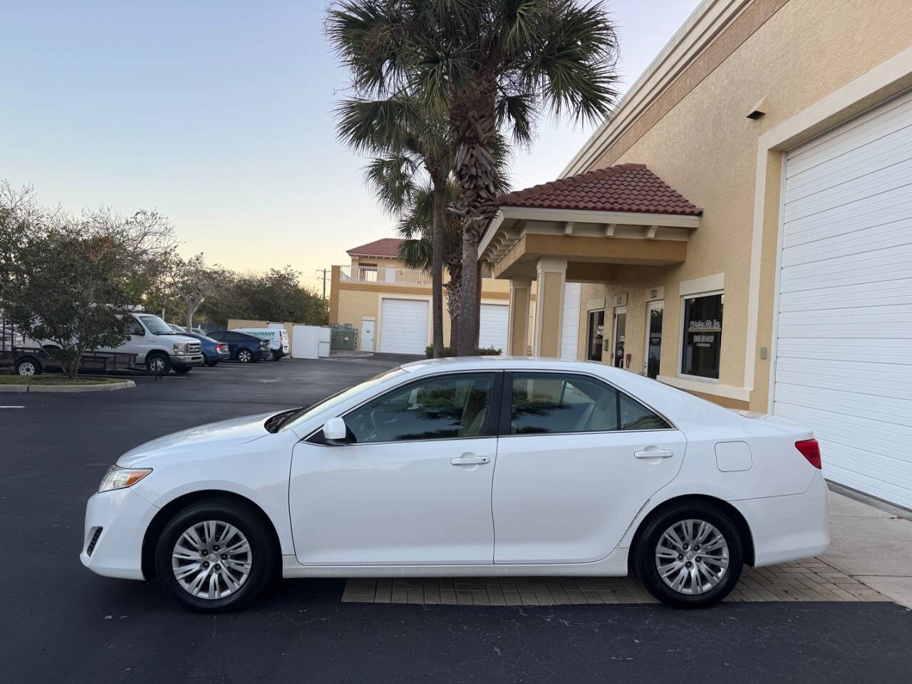 2014 Toyota Camry for sale at LP AUTO SALES in Naples, FL