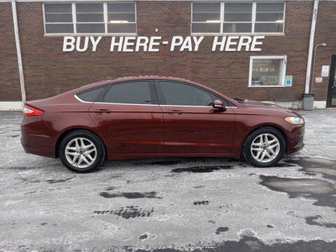 2015 Ford Fusion for sale at Kar Mart in Milan IL