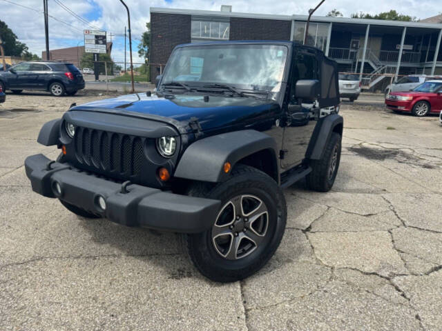 2011 Jeep Wrangler for sale at First Class Auto Mall in Akron, OH