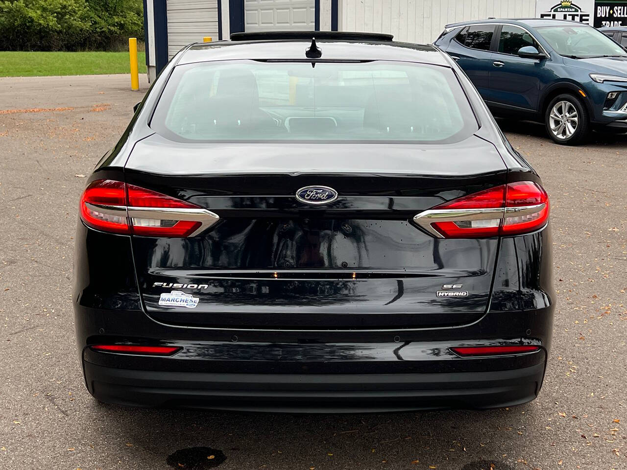 2020 Ford Fusion Hybrid for sale at Spartan Elite Auto Group LLC in Lansing, MI