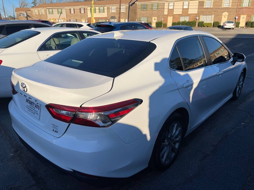 2019 Toyota Camry for sale at INTEGRITY AUTO in Dothan, AL