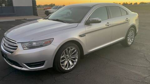 2013 Ford Taurus for sale at 911 AUTO SALES LLC in Glendale AZ