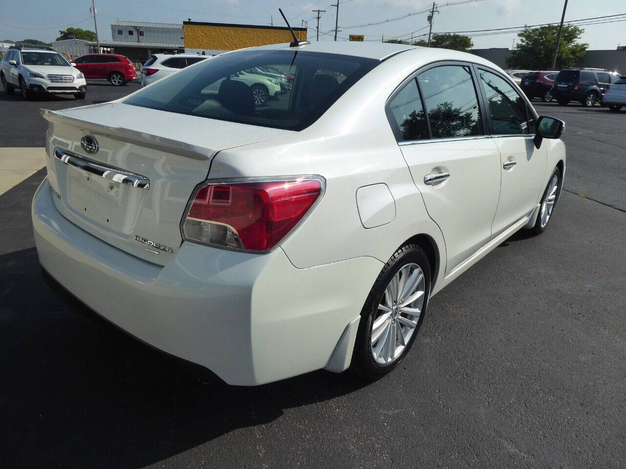 2015 Subaru Impreza for sale at Lakeshore Autos in Holland, MI