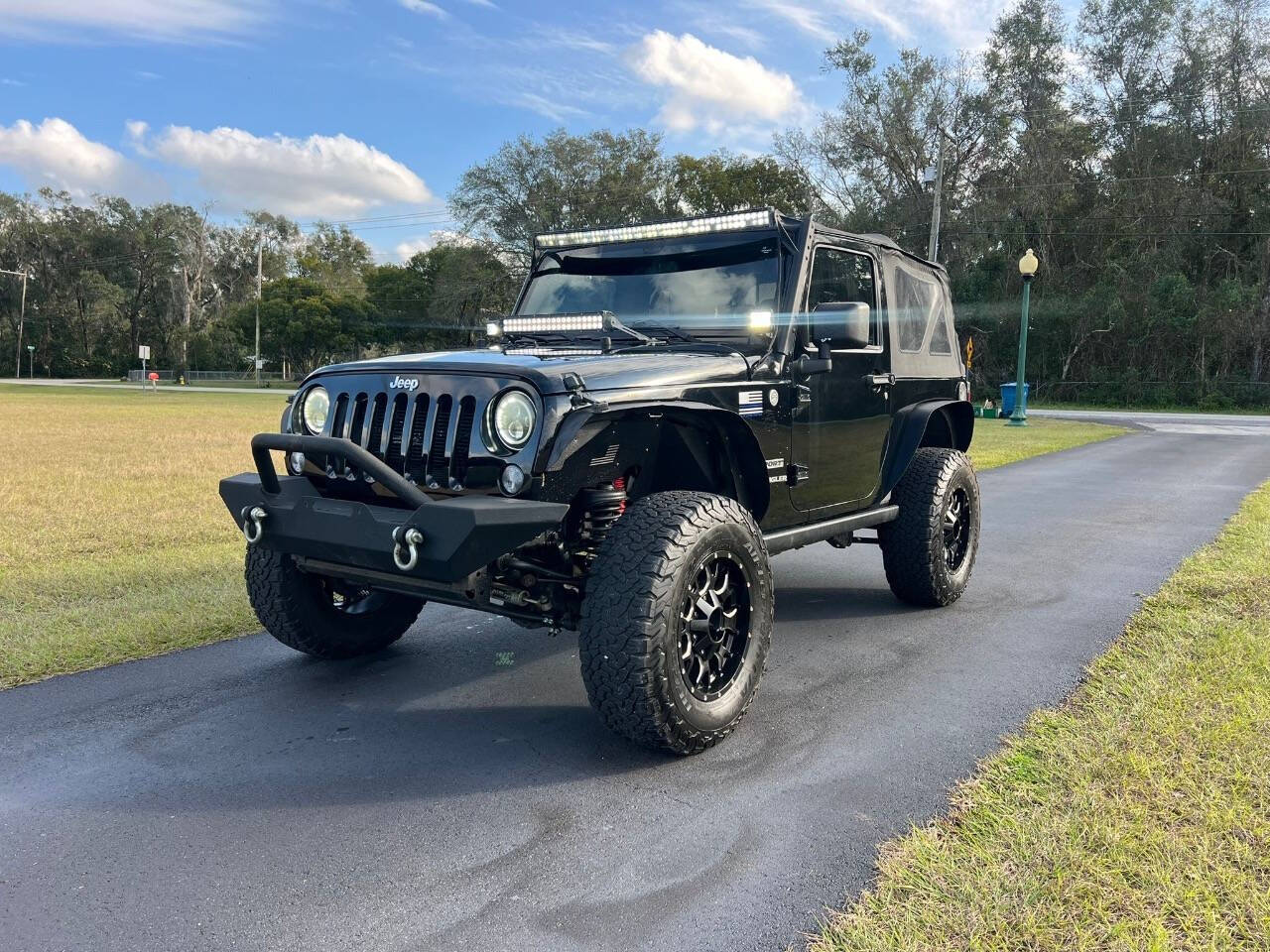 2014 Jeep Wrangler for sale at SOUTHERN AUTO WHOLESALERS in Deland, FL