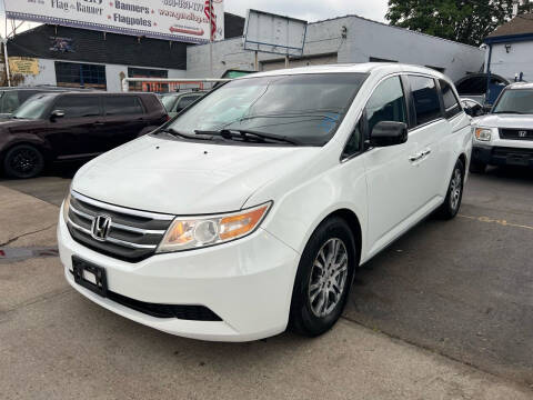 2012 Honda Odyssey for sale at Goodfellas Auto Sales LLC in Clifton NJ