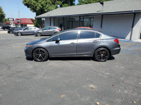 2012 Honda Civic for sale at E and M Auto Sales in Bloomington CA