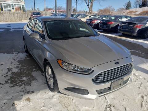 2013 Ford Fusion for sale at Divine Auto Sales LLC in Omaha NE