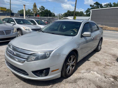 2012 Ford Fusion for sale at STEECO MOTORS in Tampa FL