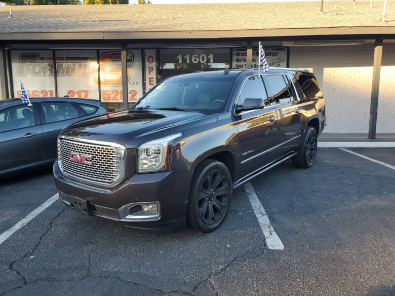 2015 GMC Yukon XL for sale at E and M Auto Sales in Bloomington CA