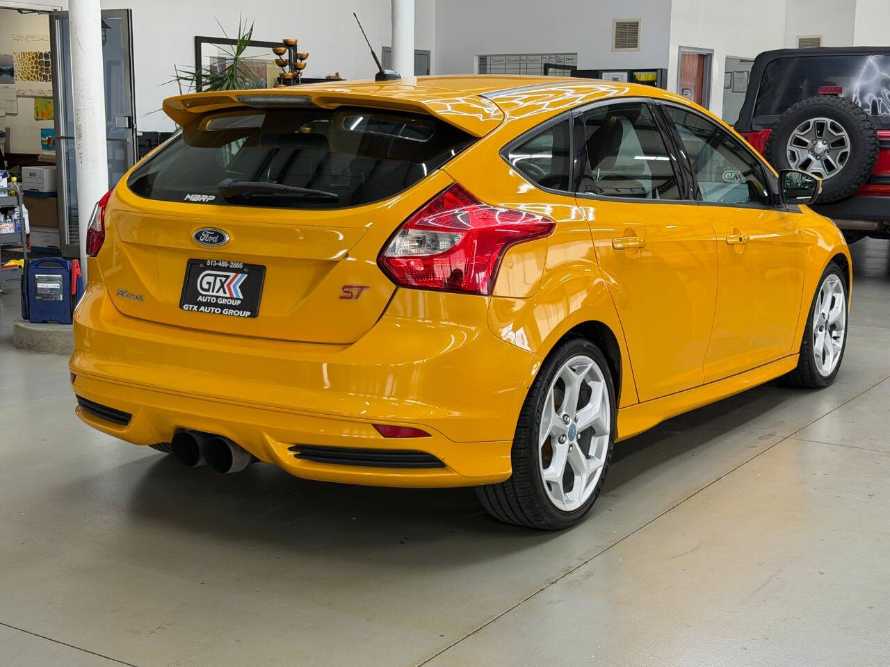 Orange 2013 Ford Focus ST ST 4dr Hatchback 2