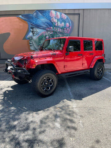 2015 Jeep Wrangler Unlimited for sale at EA Motorgroup in Austin TX