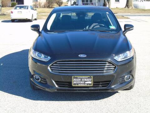2014 Ford Fusion Hybrid for sale at MAIN STREET MOTORS in Norristown PA