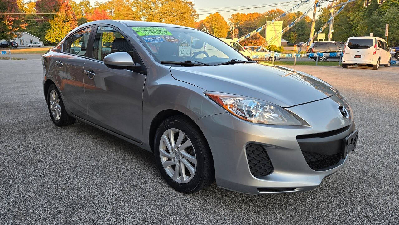 2012 Mazda Mazda3 for sale at North Ridge Auto Center LLC in Madison, OH