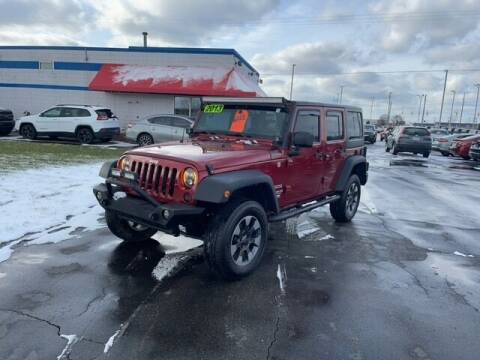 2013 Jeep Wrangler Unlimited for sale at BORGMAN OF HOLLAND LLC in Holland MI