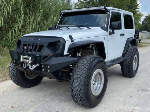 2012 Jeep Wrangler for sale at AC MOTORCARS LLC in Houston TX