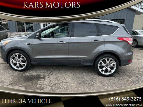 2014 Ford Escape for sale at KARS MOTORS in Wyoming MI