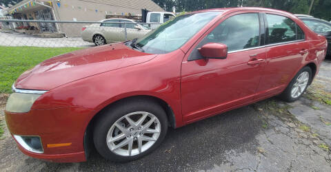2010 Ford Fusion for sale at HARDIN AUTOS in Jonesboro GA