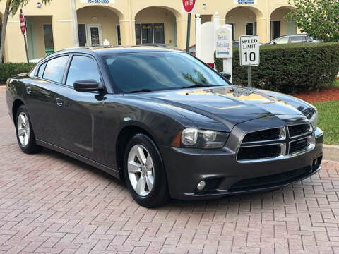 2014 Dodge Charger for sale at CarMart of Broward in Lauderdale Lakes FL