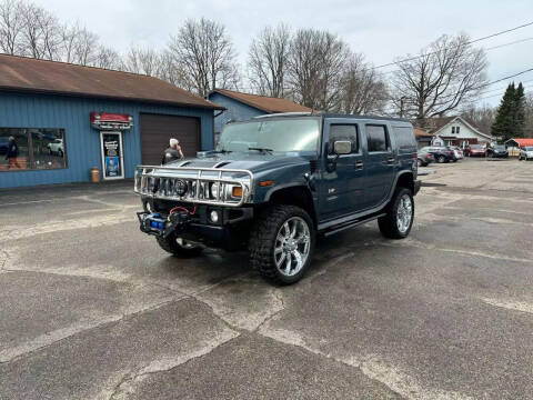 2005 HUMMER H2 for sale at Rombaugh's Auto Sales in Battle Creek MI