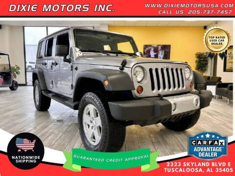 2013 Jeep Wrangler Unlimited for sale at Dixie Motors Inc. in Tuscaloosa AL
