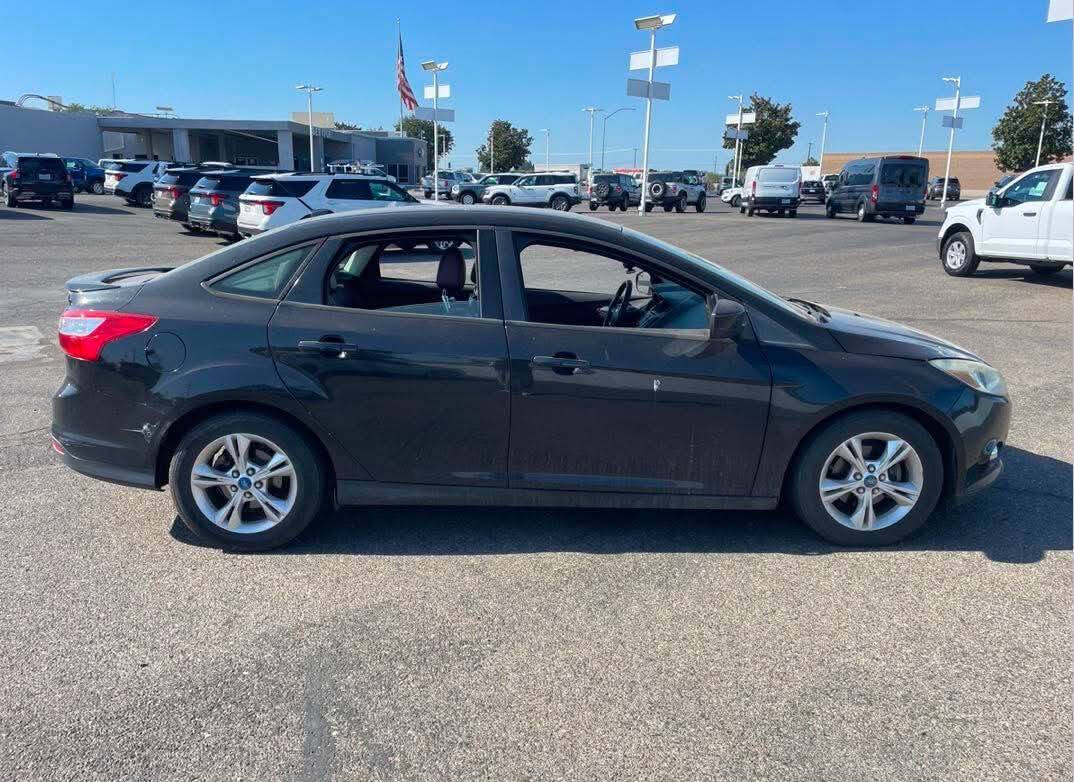 Black 2012 Ford Focus SE SE 4dr Sedan 1