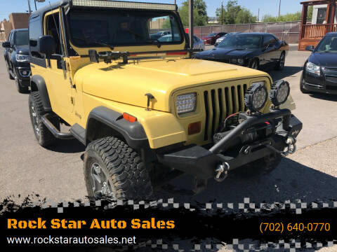 1991 Jeep Wrangler for sale at ROCK STAR TRUCK & AUTO LLC in Las Vegas NV