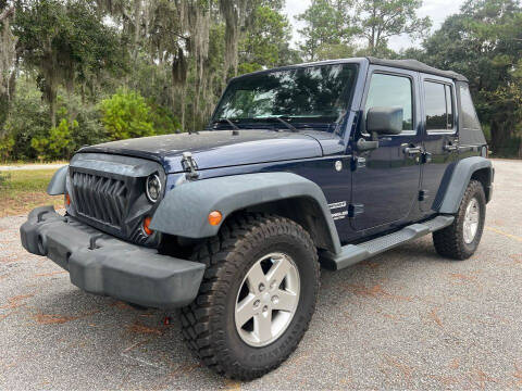 2013 Jeep Wrangler Unlimited for sale at DRIVELINE in Savannah GA