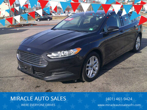 2015 Ford Fusion for sale at MIRACLE AUTO SALES in Cranston RI