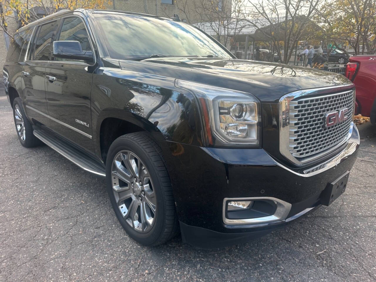 2015 GMC Yukon XL for sale at JUST AUTOS in MINNEAPOLIS, MN