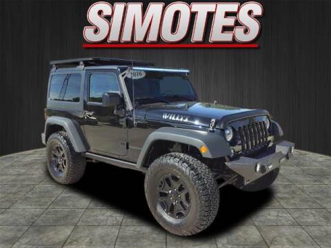 2016 Jeep Wrangler for sale at SIMOTES MOTORS in Minooka IL