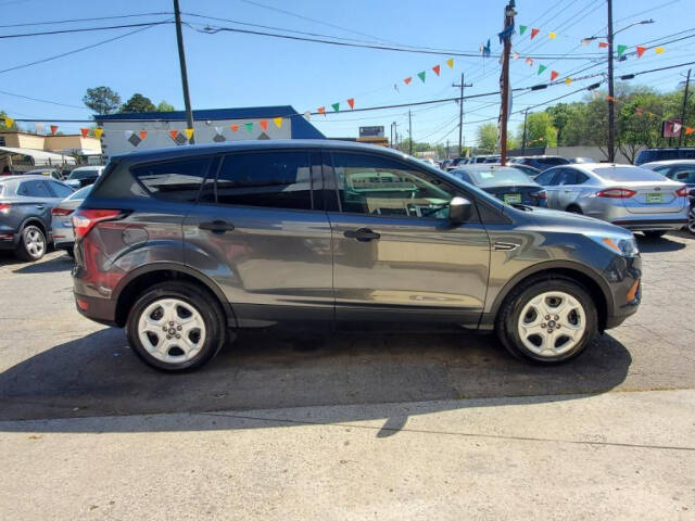 2017 Ford Escape for sale at DAGO'S AUTO SALES LLC in Dalton, GA