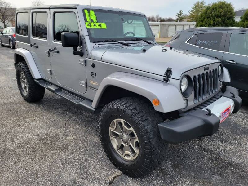 2014 Jeep Wrangler Unlimited for sale at Cooley Auto Sales in North Liberty IA