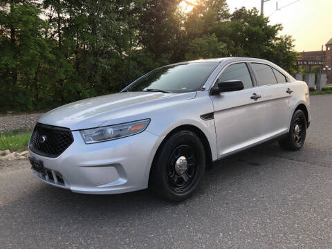2013 Ford Taurus for sale at Auto Star in Osseo MN