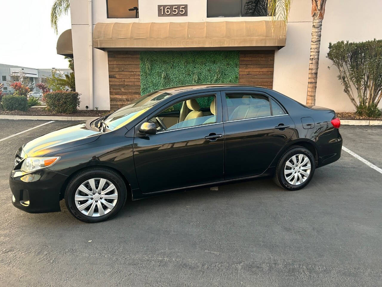 2013 Toyota Corolla for sale at STM AUTO GROUP LLC in Corona, CA