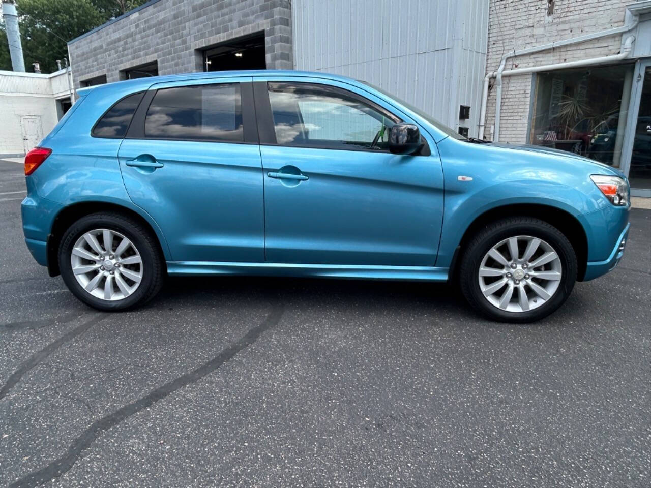 2011 Mitsubishi Outlander Sport for sale at Auto Shop in Wyoming, MI