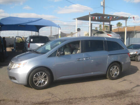 2012 Honda Odyssey for sale at Town and Country Motors - 1702 East Van Buren Street in Phoenix AZ