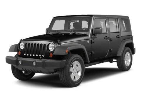 2013 Jeep Wrangler Unlimited for sale at HILAND TOYOTA in Moline IL