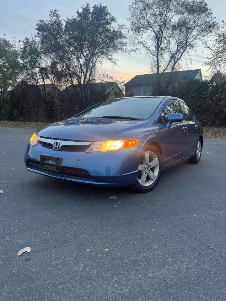 2006 Honda Civic for sale at H & H AUTO GROUP in Detroit, MI