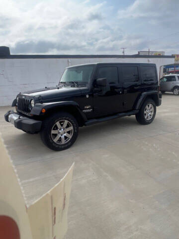 2013 Jeep Wrangler Unlimited for sale at Wolff Auto Sales in Clarksville TN
