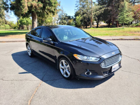 2015 Ford Fusion for sale at ROBLES MOTORS in San Jose CA