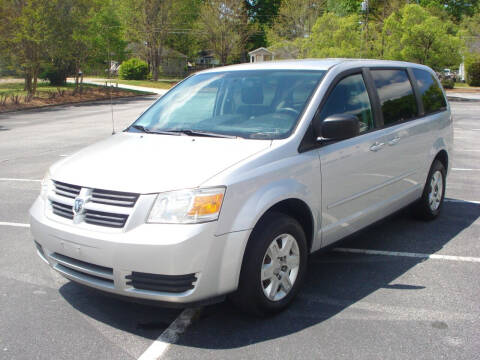 2010 Dodge Grand Caravan for sale at Uniworld Auto Sales LLC. in Greensboro NC