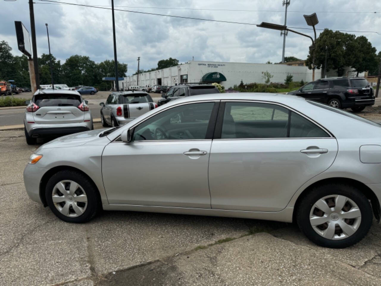 2009 Toyota Camry for sale at First Class Auto Mall in Akron, OH