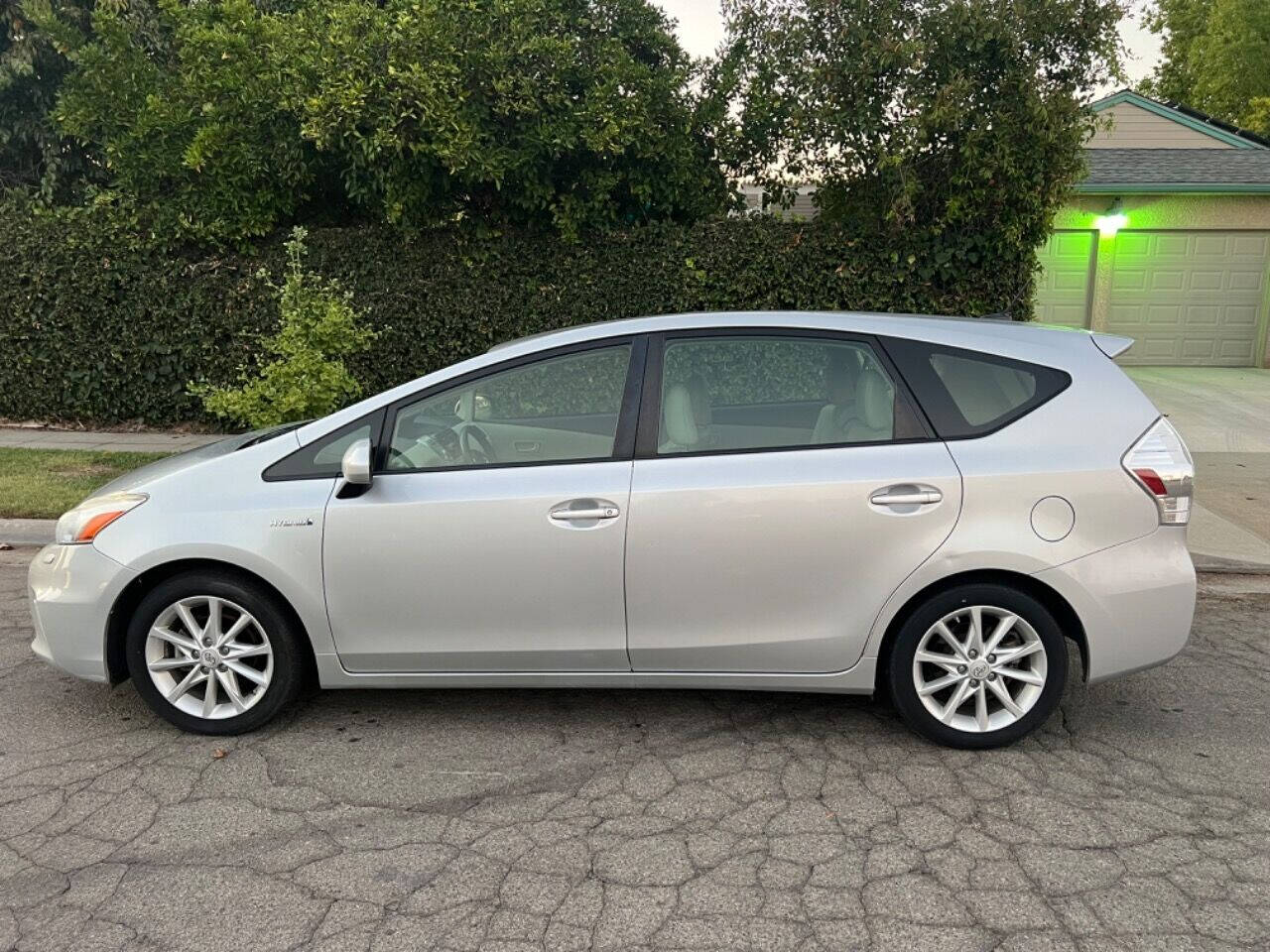 2012 Toyota Prius v for sale at AUTO 4 LESS in Fresno, CA