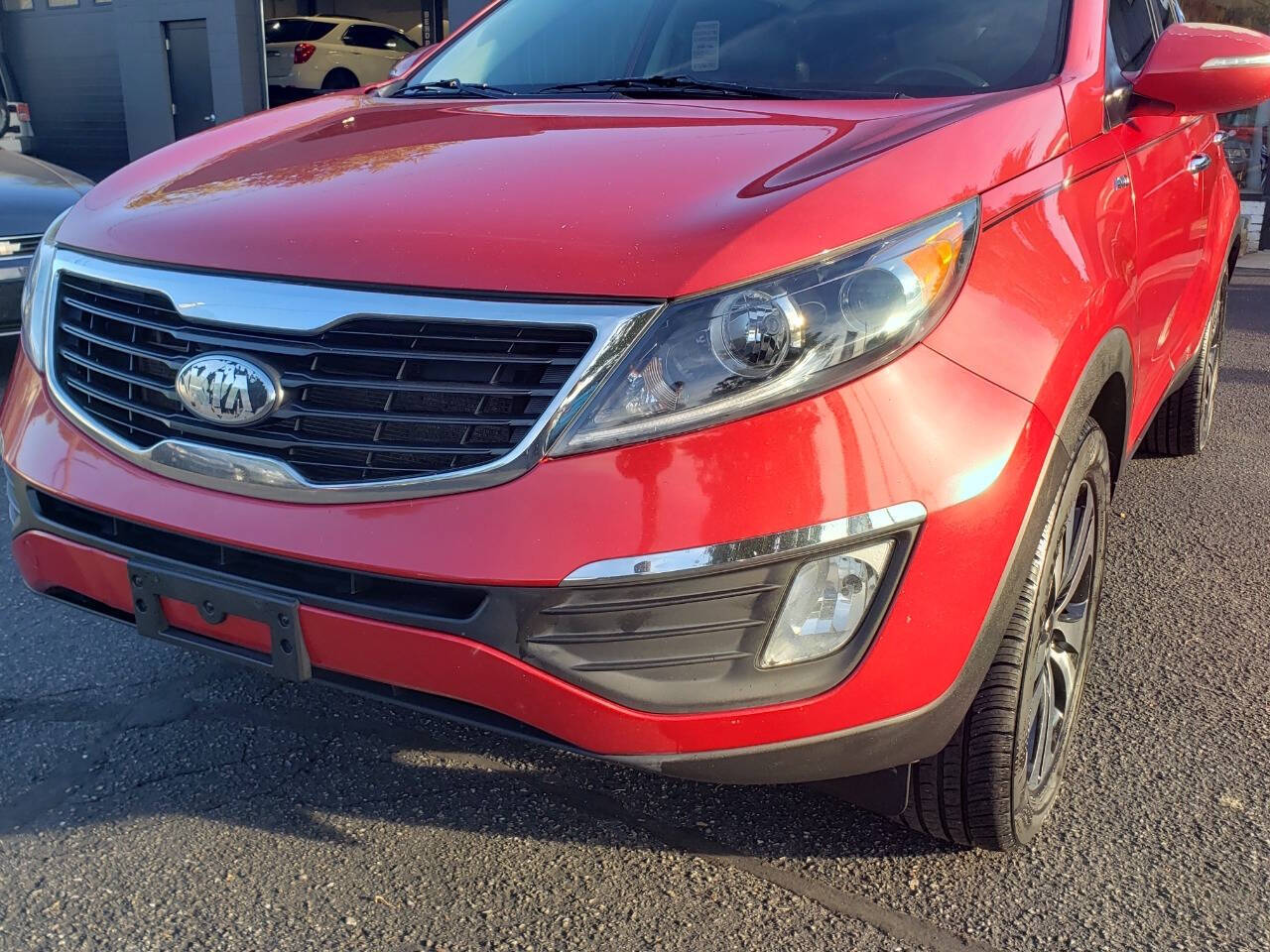 2013 Kia Sportage for sale at Auto Shop in Wyoming, MI